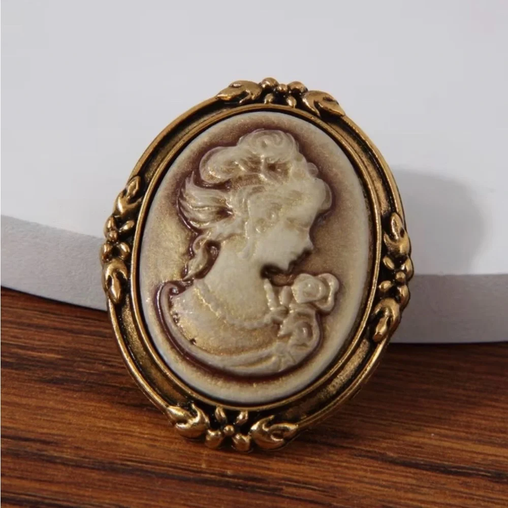 New vintage-style looking cameo brooch resin portrait gold-toned metal frame